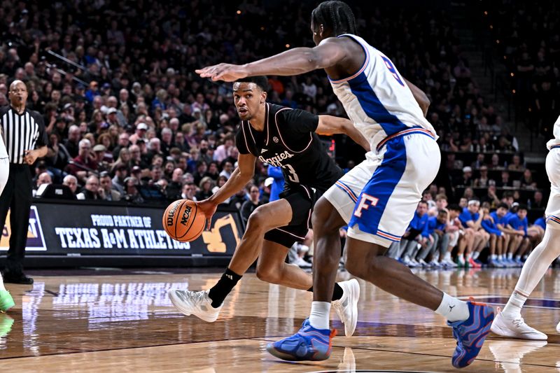 Feb 7, 2026; College Station, Texas, USA; Texas A&M Aggies guard Rylan Griffen (3) drives against Florida Gators center Rueben Chinyelu (9) during the second half at Reed Arena. Mandatory Credit: Maria Lysaker-Imagn Images 