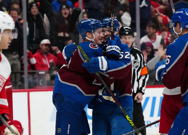 Mar 6, 2024; Denver, Colorado, USA; Colorado Avalanche defenseman Cale Makar (8) celebrates his second goal scored with left wing Artturi Lehkonen (62) during the second period at Ball Arena. Mandatory Credit: Ron Chenoy-USA TODAY Sports