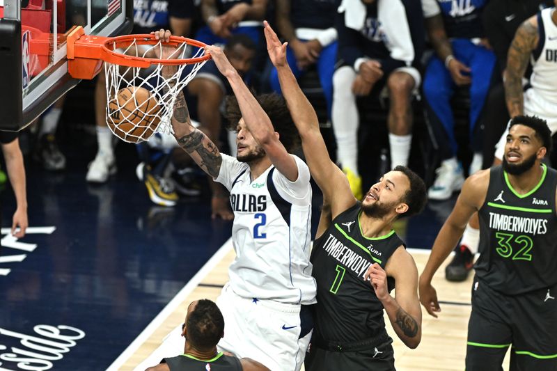 MINNEAPOLIS, MINNESOTA - MAY 30: Dereck Lively II #2 of the Dallas Mavericks dunks the ball during the first quarter against the Minnesota Timberwolves in Game Five of the Western Conference Finals at Target Center on May 30, 2024 in Minneapolis, Minnesota. NOTE TO USER: User expressly acknowledges and agrees that, by downloading and or using this photograph, User is consenting to the terms and conditions of the Getty Images License Agreement. (Photo by Stephen Maturen/Getty Images)