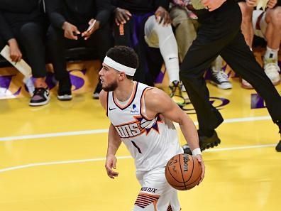 LOS ANGELES, CA - DECEMBER 5: Devin Booker #1 of the Phoenix Suns dribbles the ball during the game against the Los Angeles Lakers during the Quarterfinals of the In-Season Tournament on December 5, 2023 at Crypto.Com Arena in Los Angeles, California. NOTE TO USER: User expressly acknowledges and agrees that, by downloading and/or using this Photograph, user is consenting to the terms and conditions of the Getty Images License Agreement. Mandatory Copyright Notice: Copyright 2023 NBAE (Photo by Adam Pantozzi/NBAE via Getty Images)