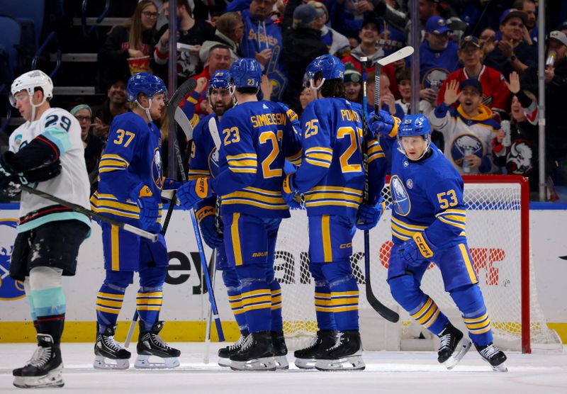 Jan 9, 2024; Buffalo, New York, USA;  Buffalo Sabres left wing Jeff Skinner (53) celebrates his goal with teammates during the first period against the Seattle Kraken at KeyBank Center. Mandatory Credit: Timothy T. Ludwig-USA TODAY Sports