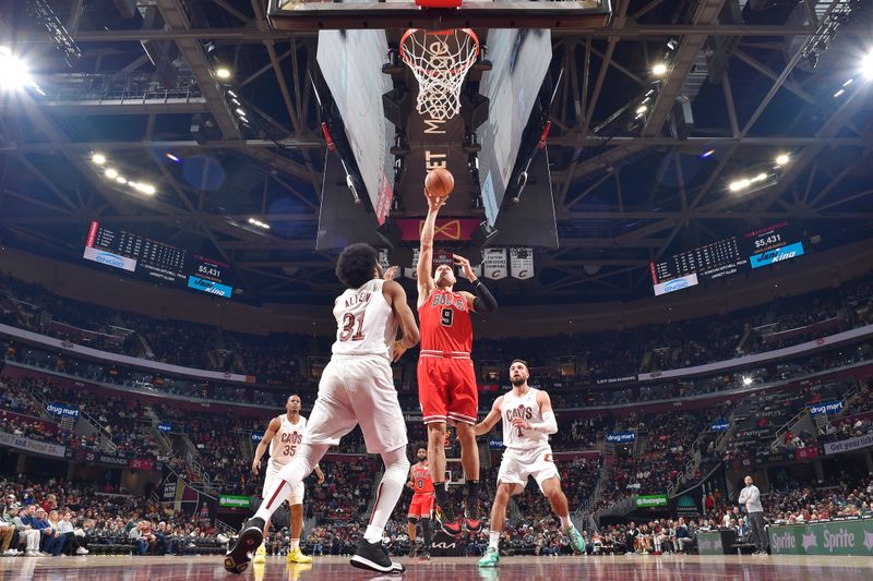 CLEVELAND, OH - JANUARY 15: Nikola Vucevic #9 of the Chicago Bulls shoots the ball during the game against the Cleveland Cavaliers on January 15, 2024 at Rocket Mortgage FieldHouse in Cleveland, Ohio. NOTE TO USER: User expressly acknowledges and agrees that, by downloading and/or using this Photograph, user is consenting to the terms and conditions of the Getty Images License Agreement. Mandatory Copyright Notice: Copyright 2024 NBAE (Photo by David Liam Kyle/NBAE via Getty Images)