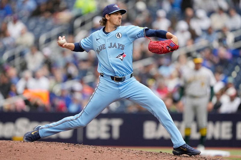 Jun 1, 2025; Toronto, Ontario, CAN; Toronto Blue Jays starting pitcher Kevin Gausman (34) pitches to the Oakland Athletics during the fourth inning at Rogers Centre. Mandatory Credit: John E. Sokolowski-Imagn Images
