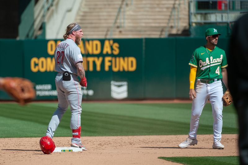 Apr 29, 2023; Oakland, California, USA; Cincinnati Reds right fielder Jake Fraley (27) celebrates after hitting an RBI double during the ninth inning against the Oakland Athletics at RingCentral Coliseum. Mandatory Credit: Ed Szczepanski-USA TODAY Sports