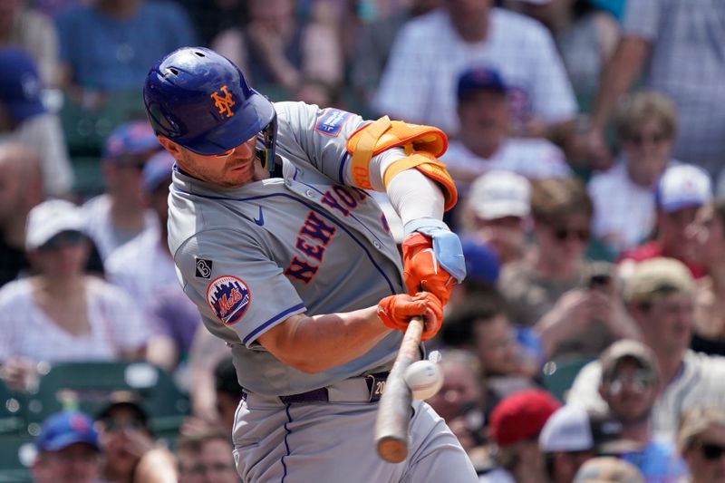 Jun 22, 2024; Chicago, Illinois, USA; New York Mets first baseman Pete Alonso (20) hits a single against the Chicago Cubs during the sixth inning at Wrigley Field. Mandatory Credit: David Banks-USA TODAY Sports