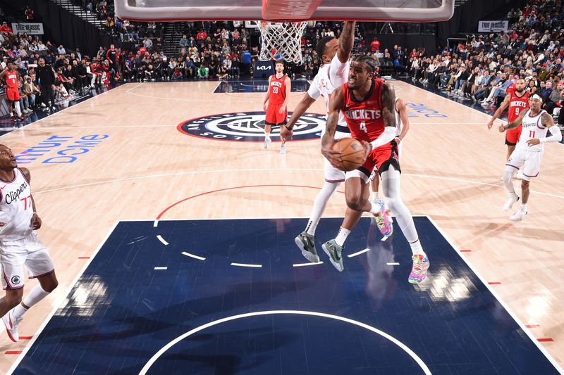 INGLEWOOD, CA - DECEMBER 8: Jalen Green #4 of the Houston Rockets drives to the basket during the game against the LA Clippers on December 8, 2024 at Intuit Dome in Los Angeles, California. NOTE TO USER: User expressly acknowledges and agrees that, by downloading and/or using this Photograph, user is consenting to the terms and conditions of the Getty Images License Agreement. Mandatory Copyright Notice: Copyright 2024 NBAE (Photo by Juan Ocampo/NBAE via Getty Images)