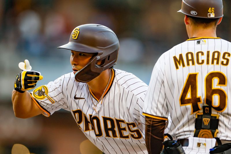 Jul 29, 2023; San Diego, California, USA; San Diego Padres second baseman Ha-Seong Kim (7) celebrates with the Padres dugout after hitting a single during the fifth inning against the Texas Rangers at Petco Park. Mandatory Credit: David Frerker-USA TODAY Sports