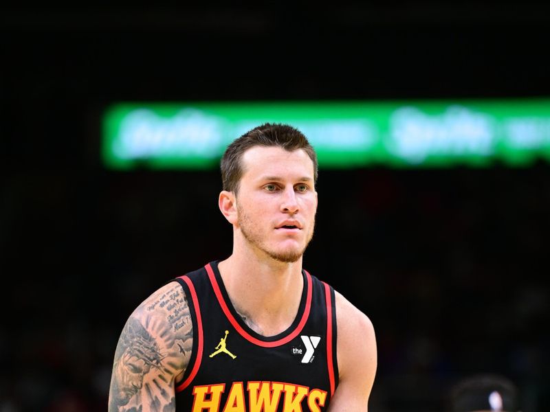 ATLANTA, GA - NOVEMBER 15:  Garrison Mathews #24 of the Atlanta Hawks prepares to shoot a free throw during the game against the Washington Wizards during the Emirates NBA Cup game on November 15, 2024 at State Farm Arena in Atlanta, Georgia.  NOTE TO USER: User expressly acknowledges and agrees that, by downloading and/or using this Photograph, user is consenting to the terms and conditions of the Getty Images License Agreement. Mandatory Copyright Notice: Copyright 2024 NBAE (Photo by Adam Hagy/NBAE via Getty Images)