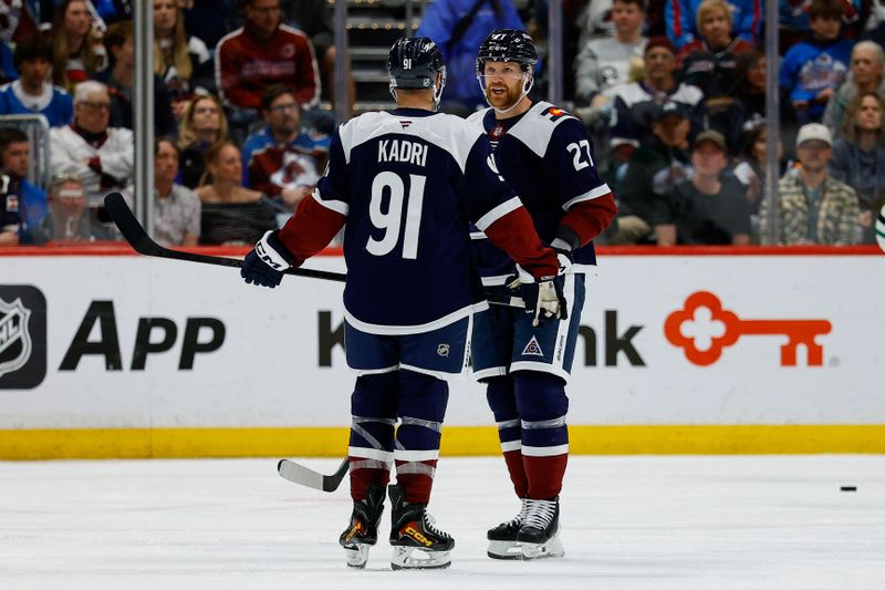 Mar 18, 2026; Denver, Colorado, USA; Colorado Avalanche defenseman Brett Kulak (27) and center Nazem Kadri (91) in the third period against the Dallas Stars at Ball Arena. Mandatory Credit: Isaiah J. Downing-Imagn Images