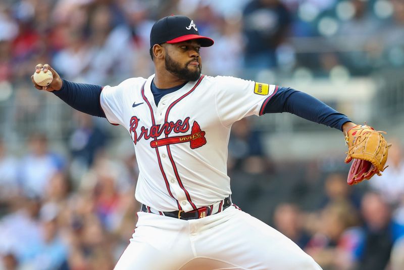 Apr 24, 2024; Atlanta, Georgia, USA; Atlanta Braves starting pitcher Reynaldo Lopez (40) throws against the Miami Marlins in the first inning at Truist Park. Mandatory Credit: Brett Davis-USA TODAY Sports