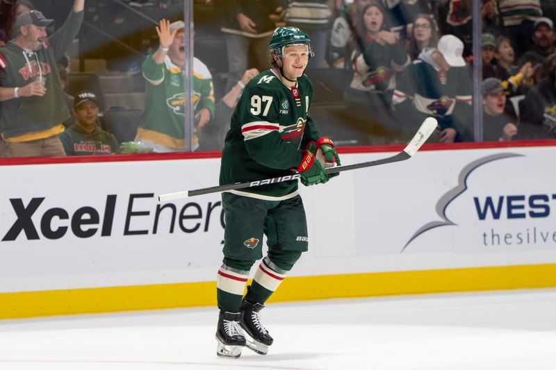 Oct 1, 2024; Saint Paul, Minnesota, USA; Minnesota Wild left wing Kirill Kaprizov (97) smiles after scoring against the Chicago Blackhawks in the second period at Xcel Energy Center. Mandatory Credit: Matt Blewett-Imagn Images