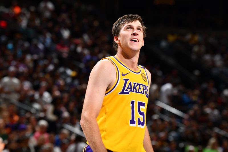 PHOENIX, AZ - OCTOBER 17: Austin Reaves #15 of the Los Angeles Lakers smiles during the game against the Phoenix Suns during a NBA Preseason game on October 17, 2024 at Footprint Center in Phoenix, Arizona. NOTE TO USER: User expressly acknowledges and agrees that, by downloading and or using this photograph, user is consenting to the terms and conditions of the Getty Images License Agreement. Mandatory Copyright Notice: Copyright 2024 NBAE (Photo by Barry Gossage/NBAE via Getty Images)