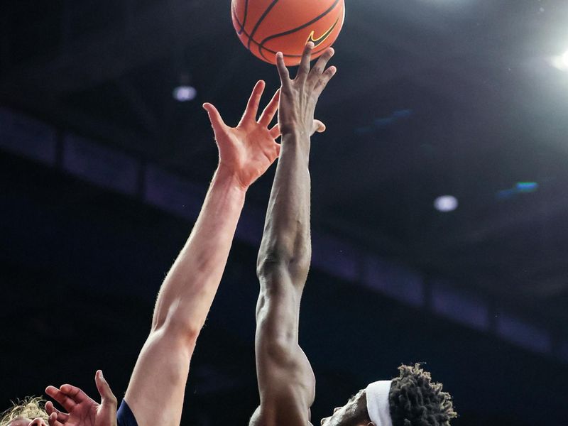 Feb 18, 2026; Tucson, Arizona, USA; Brigham Young Cougars forward AJ Dybantsa (3) shoots a lay up over Arizona Wildcats center Motiejus Krivas (13) during the first half of the game at McKale Memorial Center. Mandatory Credit: Aryanna Frank-Imagn Images