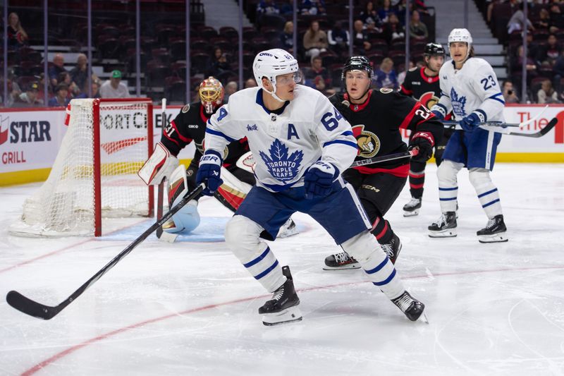 Sep 24, 2024; Ottawa, Ontario, CAN; Toronto Maple Leafs  center David Kampf (64) follows the puck in the second period against the Ottawa Senators at the Canadian Tire Centre. Mandatory Credit: Marc DesRosiers-Imagn Images