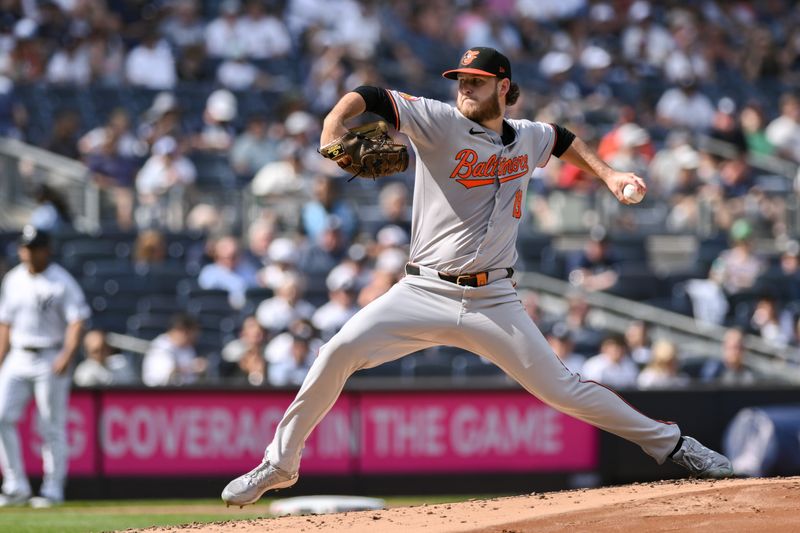 Jun 20, 2024; Bronx, New York, USA; Baltimore Orioles pitcher Cole Irvin (19) pitches against the New York Yankees during the first inning at Yankee Stadium. Mandatory Credit: John Jones-USA TODAY Sports