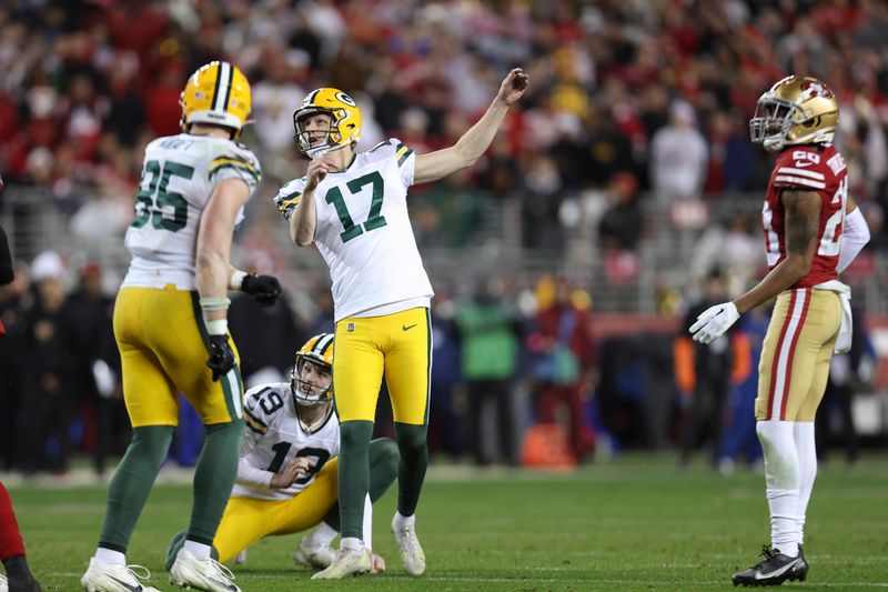 Green Bay Packers place kicker Anders Carlson (17) watches a missed field goal during the second half of an NFL football NFC divisional playoff game against the San Francisco 49ers Saturday, Jan. 20, 2024, in Santa Clara, Calif. (AP Photo/Jed Jacobsohn)