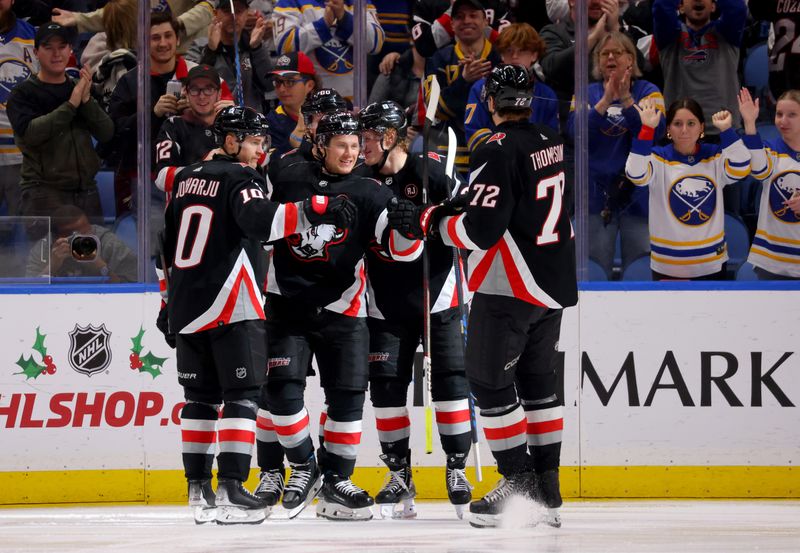 Dec 9, 2023; Buffalo, New York, USA;  Buffalo Sabres left wing Jeff Skinner (53) celebrates his goal with teammates during the third period against the Montreal Canadiens at KeyBank Center. Mandatory Credit: Timothy T. Ludwig-USA TODAY Sports