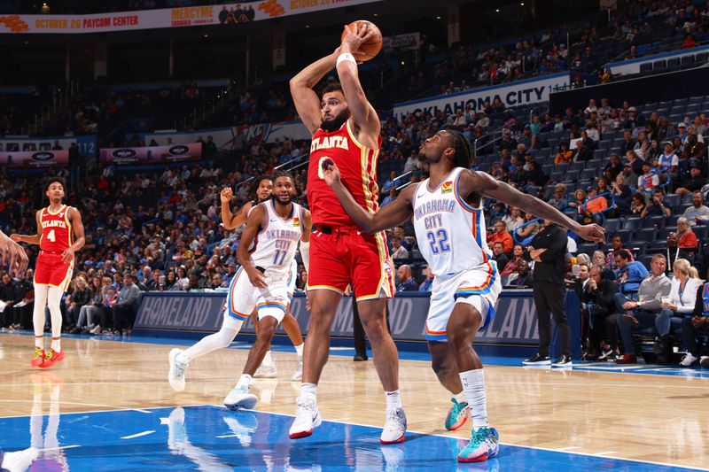 OKLAHOMA CITY, OK - OCTOBER 17: David Roddy #8 of the Atlanta Hawks looks to pass the ball during the game against the Oklahoma City Thunder on October 17, 2024 at Paycom Arena in Oklahoma City, Oklahoma. NOTE TO USER: User expressly acknowledges and agrees that, by downloading and or using this photograph, User is consenting to the terms and conditions of the Getty Images License Agreement. Mandatory Copyright Notice: Copyright 2024 NBAE (Photo by Zach Beeker/NBAE via Getty Images)