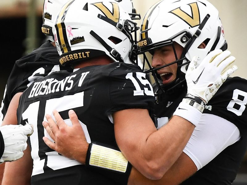 Oct 14, 2023; Nashville, Tennessee, USA; Vanderbilt Commodores wide receiver Richie Hoskins (15) celebrates with quarterback Ken Seals (8) after a touchdown during the second half against the Georgia Bulldogs at FirstBank Stadium. Mandatory Credit: Christopher Hanewinckel-USA TODAY Sports