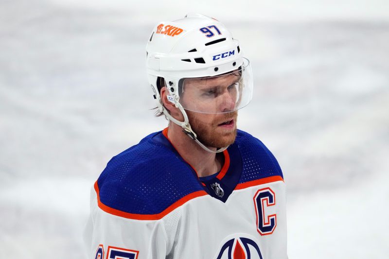 Feb 19, 2024; Tempe, Arizona, USA; Edmonton Oilers center Connor McDavid (97) skates against the Arizona Coyotes during the first period at Mullett Arena. Mandatory Credit: Joe Camporeale-USA TODAY Sports