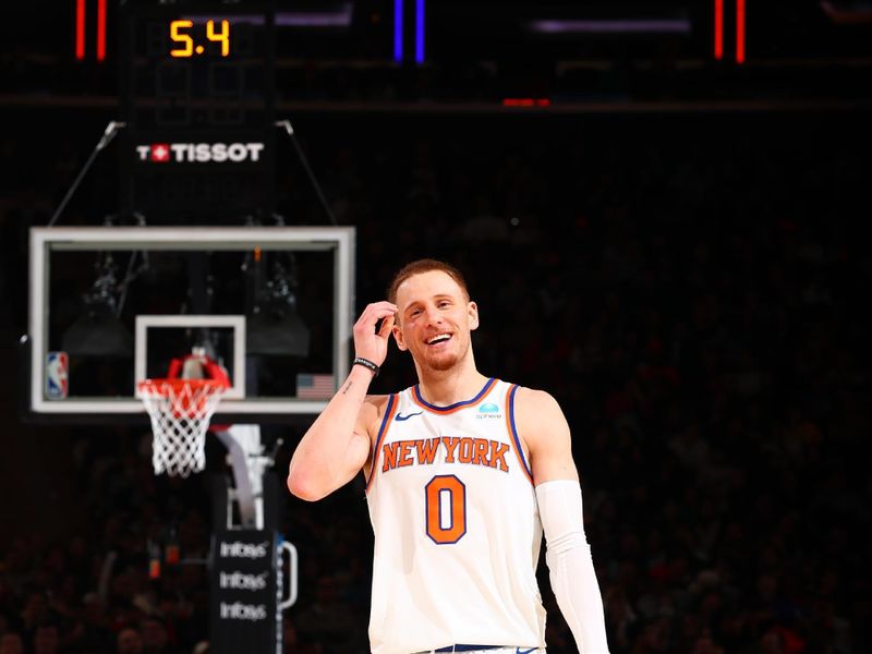 NEW YORK, NY - MARCH 25:  Donte Divincenzo #0 of the New York Knicks smiles during the game against the Detroit Pistons on March 25, 2024 at Madison Square Garden in New York City, New York.  NOTE TO USER: User expressly acknowledges and agrees that, by downloading and or using this photograph, User is consenting to the terms and conditions of the Getty Images License Agreement. Mandatory Copyright Notice: Copyright 2024 NBAE  (Photo by David L. Nemec /NBAE via Getty Images)