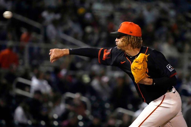 Mar 19, 2024; Scottsdale, Arizona, USA; San Francisco Giants pitcher Spencer Bivens throws against the Kansas City Royals (94) in the first inning at Scottsdale Stadium. Mandatory Credit: Rick Scuteri-USA TODAY Sports