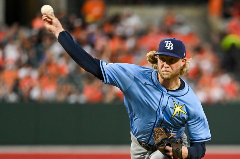 Sep 6, 2024; Baltimore, Maryland, USA;  Tampa Bay Rays pitcher Shane Baz (11) throws a first inning pitch against the Baltimore Orioles at Oriole Park at Camden Yards. Mandatory Credit: Tommy Gilligan-Imagn Images