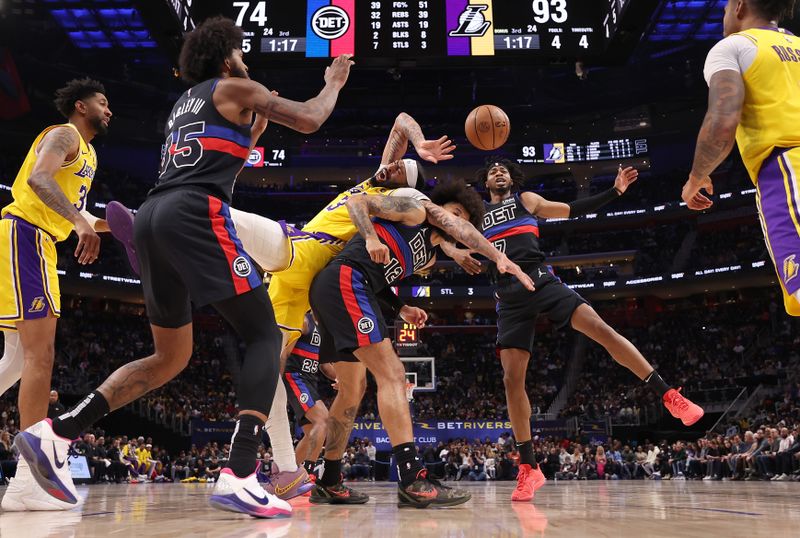 DETROIT, MICHIGAN - NOVEMBER 29: Anthony Davis #3 of the Los Angeles Lakers battles for a rebound with Isaiah Livers #12 of the Detroit Pistons during the second halfat Little Caesars Arena on November 29, 2023 in Detroit, Michigan. The Los Angeles Lakers won the game 133-107. NOTE TO USER: User expressly acknowledges and agrees that, by downloading and or using this photograph, User is consenting to the terms and conditions of the Getty Images License Agreement. (Photo by Gregory Shamus/Getty Images)