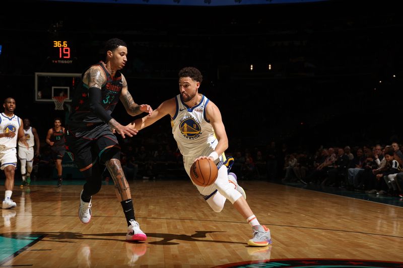 WASHINGTON, DC -? FEBRUARY 27: Klay Thompson #11 of the Golden State Warriors drives to the basket against Kyle Kuzma #33 of the Washington Wizards during the game on February 27, 2024 at Capital One Arena in Washington, DC. NOTE TO USER: User expressly acknowledges and agrees that, by downloading and or using this Photograph, user is consenting to the terms and conditions of the Getty Images License Agreement. Mandatory Copyright Notice: Copyright 2024 NBAE (Photo by Stephen Gosling/NBAE via Getty Images)