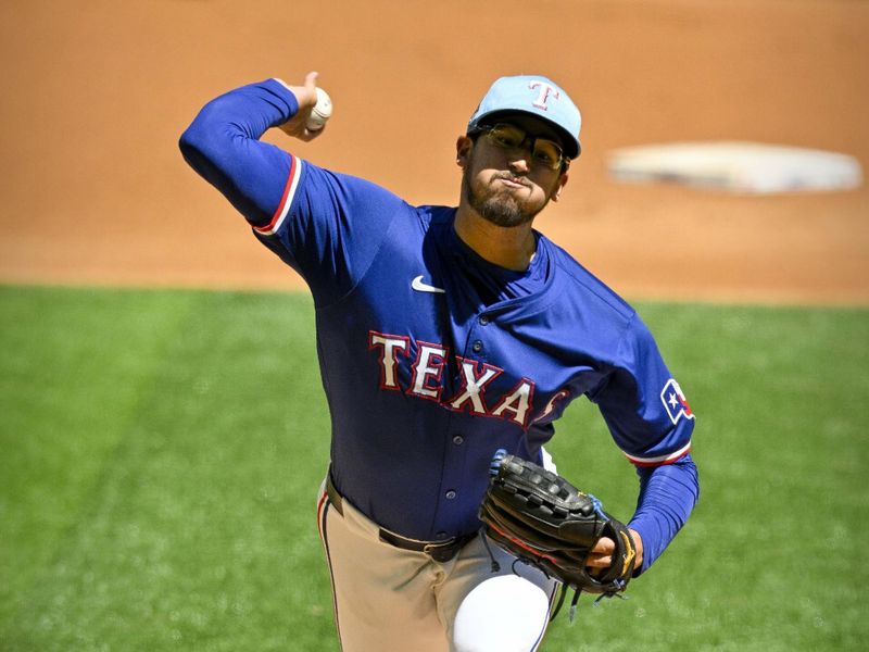 Mar 26, 2024; Arlington, Texas, USA; Texas Rangers starting pitcher Dane Dunning (33) pitches against the Boston Red Sox during the first inning at Globe Life Field. Mandatory Credit: Jerome Miron-USA TODAY Sports