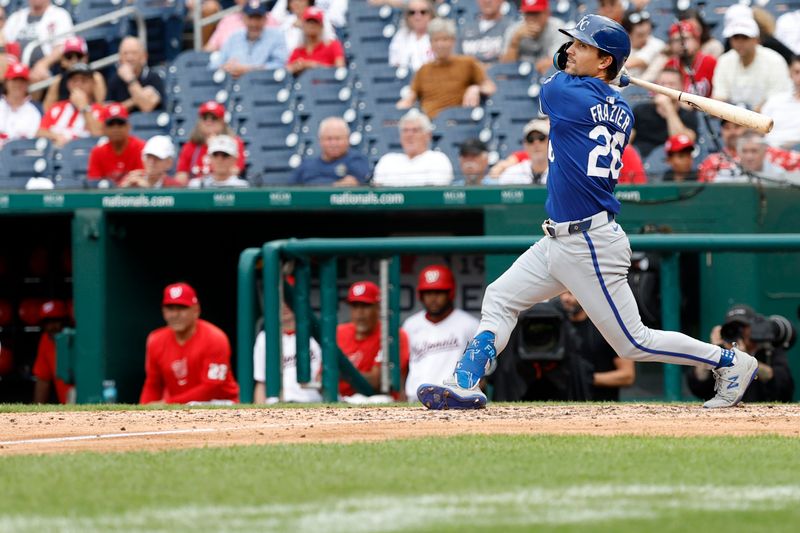 Sep 26, 2024; Washington, District of Columbia, USA; Kansas City Royals second baseman Adam Frazier (26) hits a two run single against the Washington Nationals during the ninth inning at Nationals Park. Mandatory Credit: Geoff Burke-Imagn Images