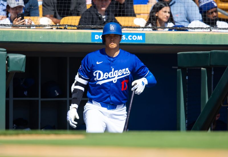 Mar 3, 2024; Phoenix, Arizona, USA; Los Angeles Dodgers designated hitter Shohei Ohtani against the Colorado Rockies during a spring training game at Camelback Ranch-Glendale. Mandatory Credit: Mark J. Rebilas-USA TODAY Sports