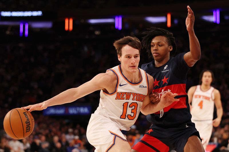 NEW YORK, NEW YORK - NOVEMBER 18: Tyler Kolek #13 of the New York Knicks dribbles against Carlton Carrington #8 of the Washington Wizards during the second half at Madison Square Garden on November 18, 2024 in New York City. NOTE TO USER: User expressly acknowledges and agrees that, by downloading and or using this photograph, User is consenting to the terms and conditions of the Getty Images License Agreement. (Photo by Sarah Stier/Getty Images)