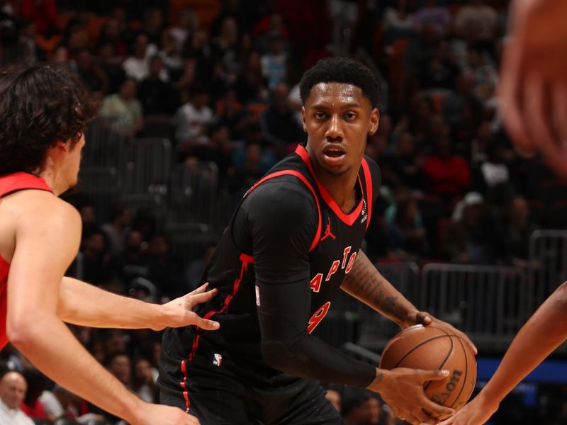 MIAMI, FL - DECEMBER 12:  RJ Barrett #9 of the Toronto Raptors handles the ball during the game against the Miami Heat on December 12, 2024 at Kaseya Center in Miami, Florida. NOTE TO USER: User expressly acknowledges and agrees that, by downloading and or using this Photograph, user is consenting to the terms and conditions of the Getty Images License Agreement. Mandatory Copyright Notice: Copyright 2024 NBAE (Photo by Issac Baldizon/NBAE via Getty Images)