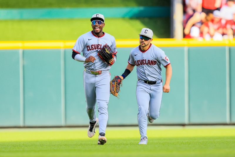 May 17, 2025; Cincinnati, Ohio, USA; Cleveland Guardians outfielder Angel Martinez (1) reacts after a play with outfielder Steven Kwan (38) in the second inning against the Cincinnati Reds at Great American Ball Park. Mandatory Credit: Katie Stratman-Imagn Images