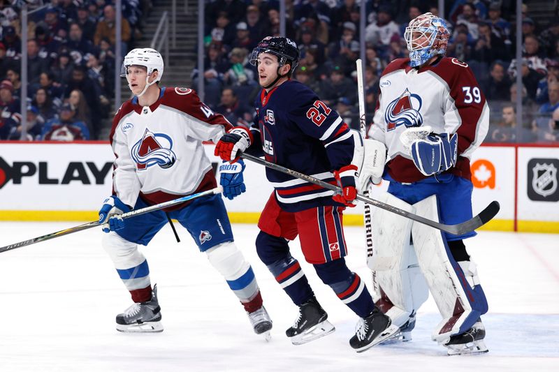 Mar 14, 2026; Winnipeg, Manitoba, CAN; Colorado Avalanche defenseman Josh Manson (42), Winnipeg Jets right wing Isak Rosen (27) and Colorado Avalanche goaltender MacKenzie Blackwood (39) watch a developing play in the second period at Canada Life Centre. Mandatory Credit: James Carey Lauder-Imagn Images Mar 14, 2026; Winnipeg, Manitoba, CAN; Colorado Avalanche defenseman Josh Manson (42), Winnipeg Jets right wing Isak Rosen (27) and Colorado Avalanche goaltender MacKenzie Blackwood (39) watch a developing play in the second period at Canada Life Centre. Mandatory Credit: James Carey Lauder-Imagn Images