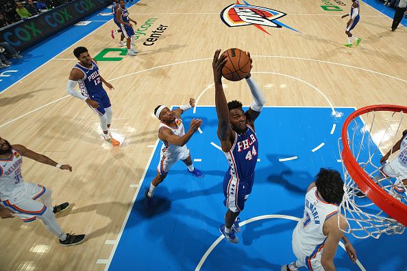 OKLAHOMA CITY, OK - NOVEMBER 25:  Paul Reed #44 of the Philadelphia 76ers grabs a rebound during the game against the Oklahoma City Thunder on November 25, 2023 at Paycom Arena in Oklahoma City, Oklahoma. NOTE TO USER: User expressly acknowledges and agrees that, by downloading and or using this photograph, User is consenting to the terms and conditions of the Getty Images License Agreement. Mandatory Copyright Notice: Copyright 2023 NBAE (Photo by Zach Beeker/NBAE via Getty Images)