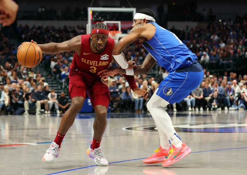 DALLAS, TEXAS - JANUARY 03: Caris LeVert #3 of the Cleveland Cavaliers tries to get past Jaden Hardy #1 of the Dallas Mavericks in the second half of an NBA basketball game at American Airlines Center on January 03, 2025 in Dallas, Texas. NOTE TO USER: User expressly acknowledges and agrees that, by downloading and or using this photograph, User is consenting to the terms and conditions of the Getty Images License Agreement.  (Photo by Richard Rodriguez/Getty Images)