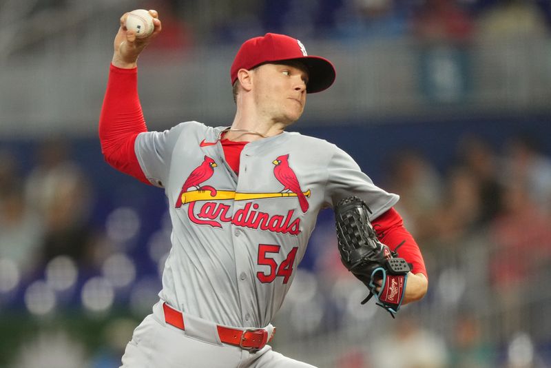 Jun 17, 2024; Miami, Florida, USA;  St. Louis Cardinals starting pitcher Sonny Gray (54) pitches in the first inning against the Miami Marlins at loanDepot Park. Mandatory Credit: Jim Rassol-USA TODAY Sports