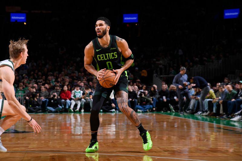 BOSTON, MA - DECEMBER 6: Jayson Tatum #0 of the Boston Celtics handles the ball during the game against the Boston Celtics on December 6, 2024 at TD Garden in Boston, Massachusetts. NOTE TO USER: User expressly acknowledges and agrees that, by downloading and/or using this Photograph, user is consenting to the terms and conditions of the Getty Images License Agreement. Mandatory Copyright Notice: Copyright 2024 NBAE (Photo by Brian Babineau/NBAE via Getty Images)