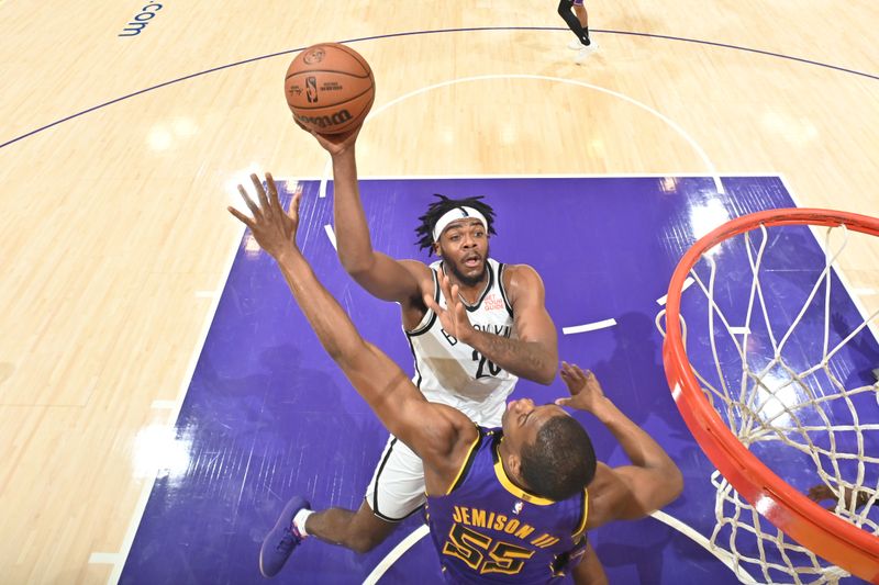 LOS ANGELES, CA - JANUARY 17: Day'Ron Sharpe #20 of the Brooklyn Nets drives to the basket during the game against the Los Angeles Lakers on January 17, 2025 at Crypto.Com Arena in Los Angeles, California. NOTE TO USER: User expressly acknowledges and agrees that, by downloading and/or using this Photograph, user is consenting to the terms and conditions of the Getty Images License Agreement. Mandatory Copyright Notice: Copyright 2025 NBAE (Photo by Adam Pantozzi/NBAE via Getty Images)