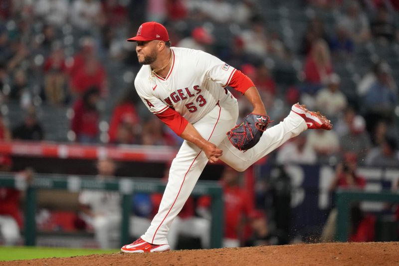 Jul 10, 2024; Anaheim, California, USA; Los Angeles Angels relief pitcher Carlos Estevez (53) throws in the ninth inning against the Texas Rangers at Angel Stadium. Mandatory Credit: Kirby Lee-USA TODAY Sports