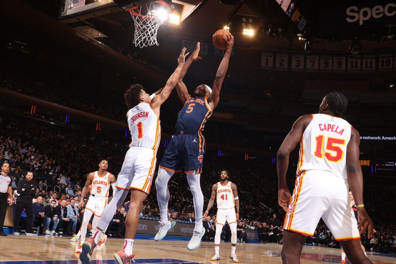 NEW YORK, NY - MARCH 5: Precious Achiuwa #5 of the New York Knicks drives to the basket during the game against the Atlanta Hawks on March 5, 2024 at Madison Square Garden in New York City, New York.  NOTE TO USER: User expressly acknowledges and agrees that, by downloading and or using this photograph, User is consenting to the terms and conditions of the Getty Images License Agreement. Mandatory Copyright Notice: Copyright 2024 NBAE  (Photo by Nathaniel S. Butler/NBAE via Getty Images)