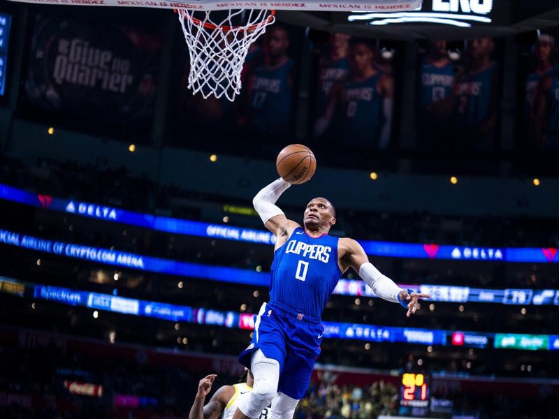 LOS ANGELES, CA - APRIL 5: Russell Westbrook #0 of the LA Clippers slam dunk the ball during the game   on April 5, 2024 at Crypto.Com Arena in Los Angeles, California. NOTE TO USER: User expressly acknowledges and agrees that, by downloading and/or using this Photograph, user is consenting to the terms and conditions of the Getty Images License Agreement. Mandatory Copyright Notice: Copyright 2024 NBAE (Photo by Tyler Ross/NBAE via Getty Images)