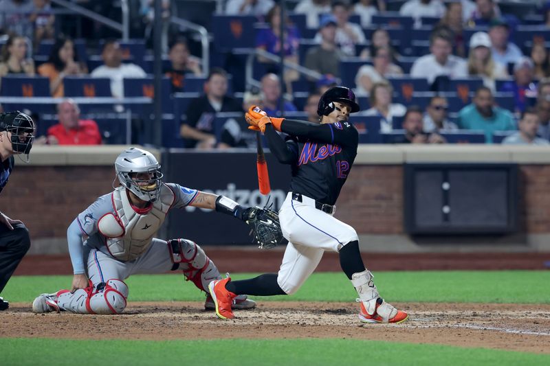 Aug 16, 2024; New York City, New York, USA; New York Mets shortstop Francisco Lindor (12) follows through on an RBI triple against the Miami Marlins during the fourth inning at Citi Field. Mandatory Credit: Brad Penner-USA TODAY Sports