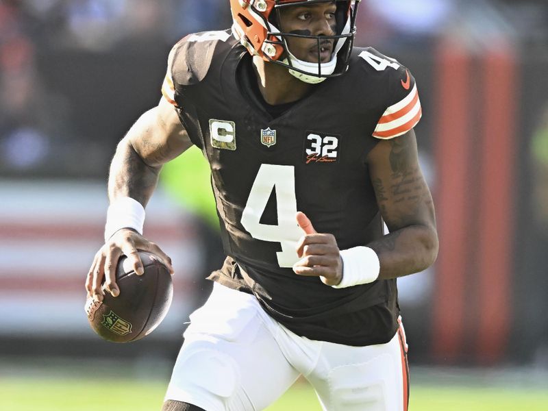 Cleveland Browns quarterback Deshaun Watson (4) rolls out to pass against the Arizona Cardinals during the first half of an NFL football game Sunday, Nov. 5, 2023, in Cleveland. (AP Photo/David Richard)