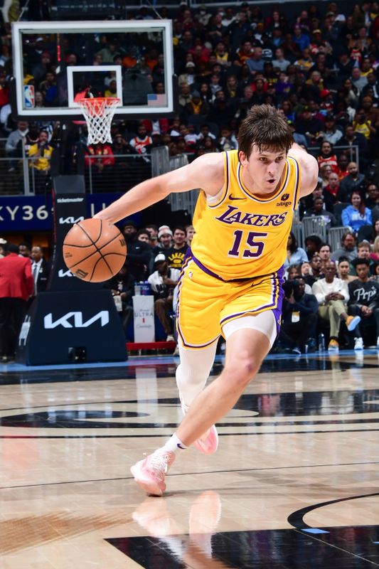 ATLANTA, GA - JANUARY 30: Austin Reaves #15 of the Los Angeles Lakers goes to the basket during the game on January 30, 2024 at State Farm Arena in Atlanta, Georgia.  NOTE TO USER: User expressly acknowledges and agrees that, by downloading and/or using this Photograph, user is consenting to the terms and conditions of the Getty Images License Agreement. Mandatory Copyright Notice: Copyright 2024 NBAE (Photo by Scott Cunningham/NBAE via Getty Images)