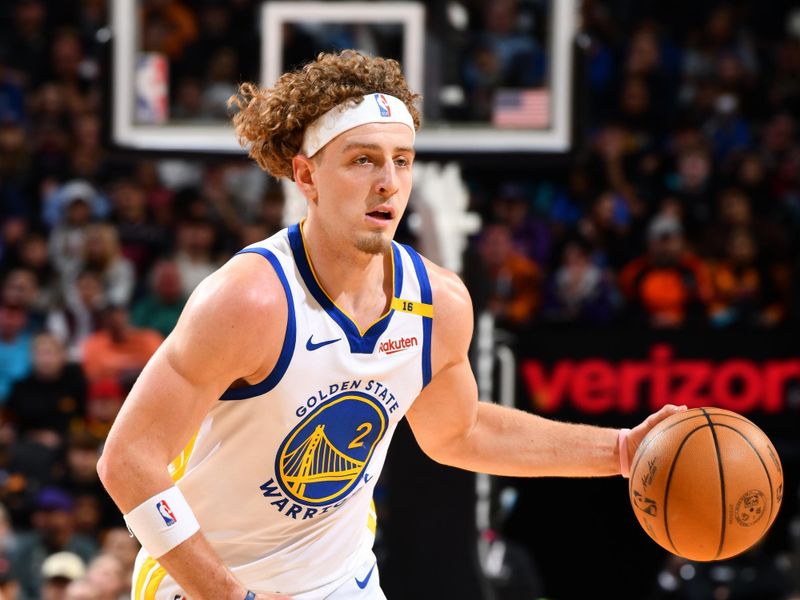 PHOENIX, AZ - NOVEMBER 30: Brandin Podziemski #2 of the Golden State Warriors dribbles the ball during the game against the Phoenix Suns on November 30, 2024 at Footprint Center in Phoenix, Arizona. NOTE TO USER: User expressly acknowledges and agrees that, by downloading and or using this photograph, user is consenting to the terms and conditions of the Getty Images License Agreement. Mandatory Copyright Notice: Copyright 2024 NBAE (Photo by Barry Gossage/NBAE via Getty Images)