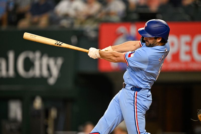 Sep 1, 2024; Arlington, Texas, USA; Texas Rangers designated hitter Josh Smith (8) drives in a run against the Oakland Athletics during the third inning at Globe Life Field. Mandatory Credit: Jerome Miron-USA TODAY Sports