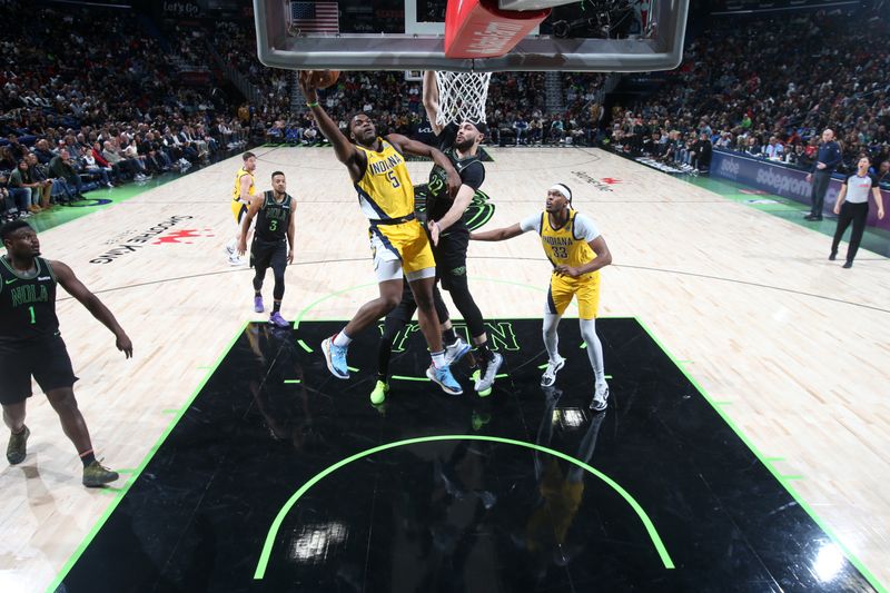NEW ORLEANS, LA - MARCH 1:  Jarace Walker #5 of the Indiana Pacers drives to the basket during the game against the New Orleans Pelicans on March 1, 2024 at the Smoothie King Center in New Orleans, Louisiana. NOTE TO USER: User expressly acknowledges and agrees that, by downloading and or using this Photograph, user is consenting to the terms and conditions of the Getty Images License Agreement. Mandatory Copyright Notice: Copyright 2024 NBAE (Photo by Layne Murdoch Jr./NBAE via Getty Images)